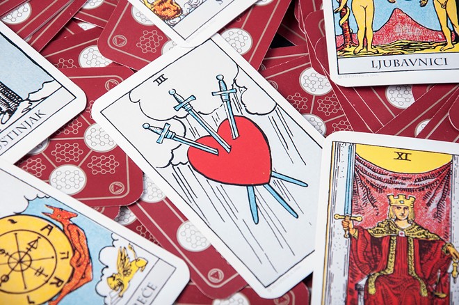 The Three of Swords, a card of heartbreak and grief. - Photo via drapnici/Adobe